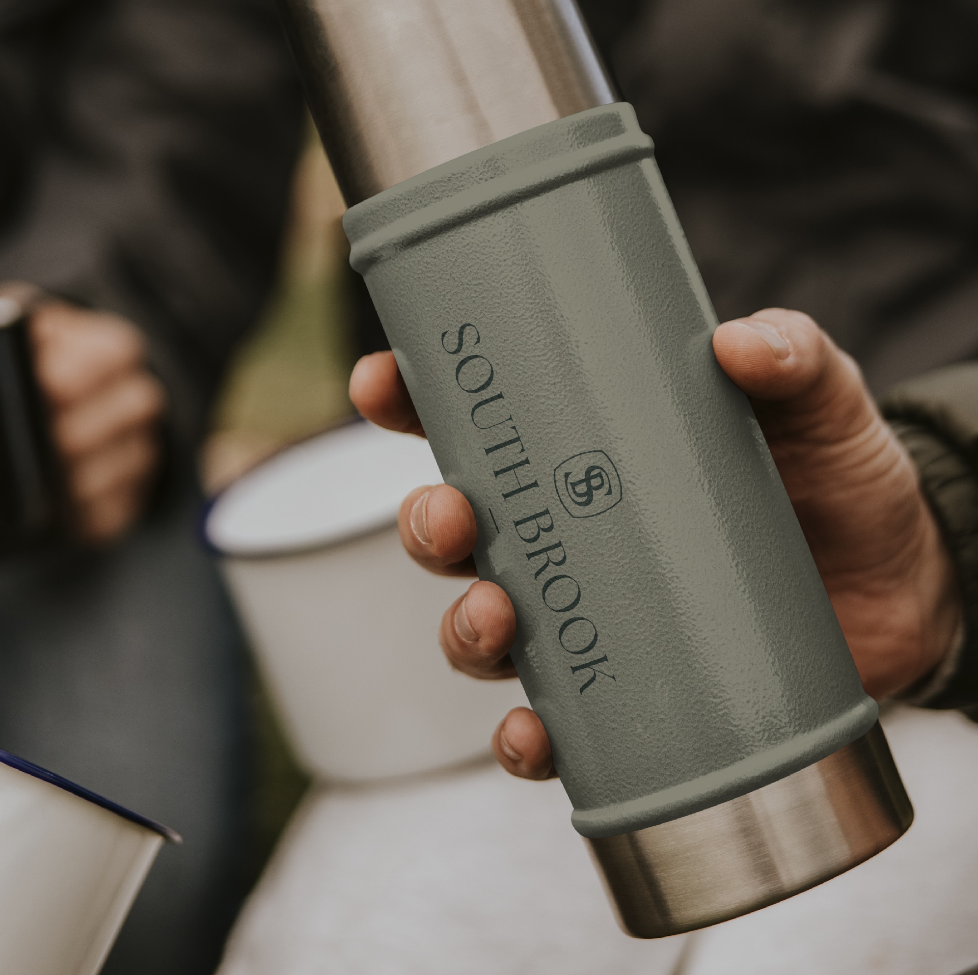 South Brook Webdesign_R6_Apparel_Luke-04 A thermos bottle being held