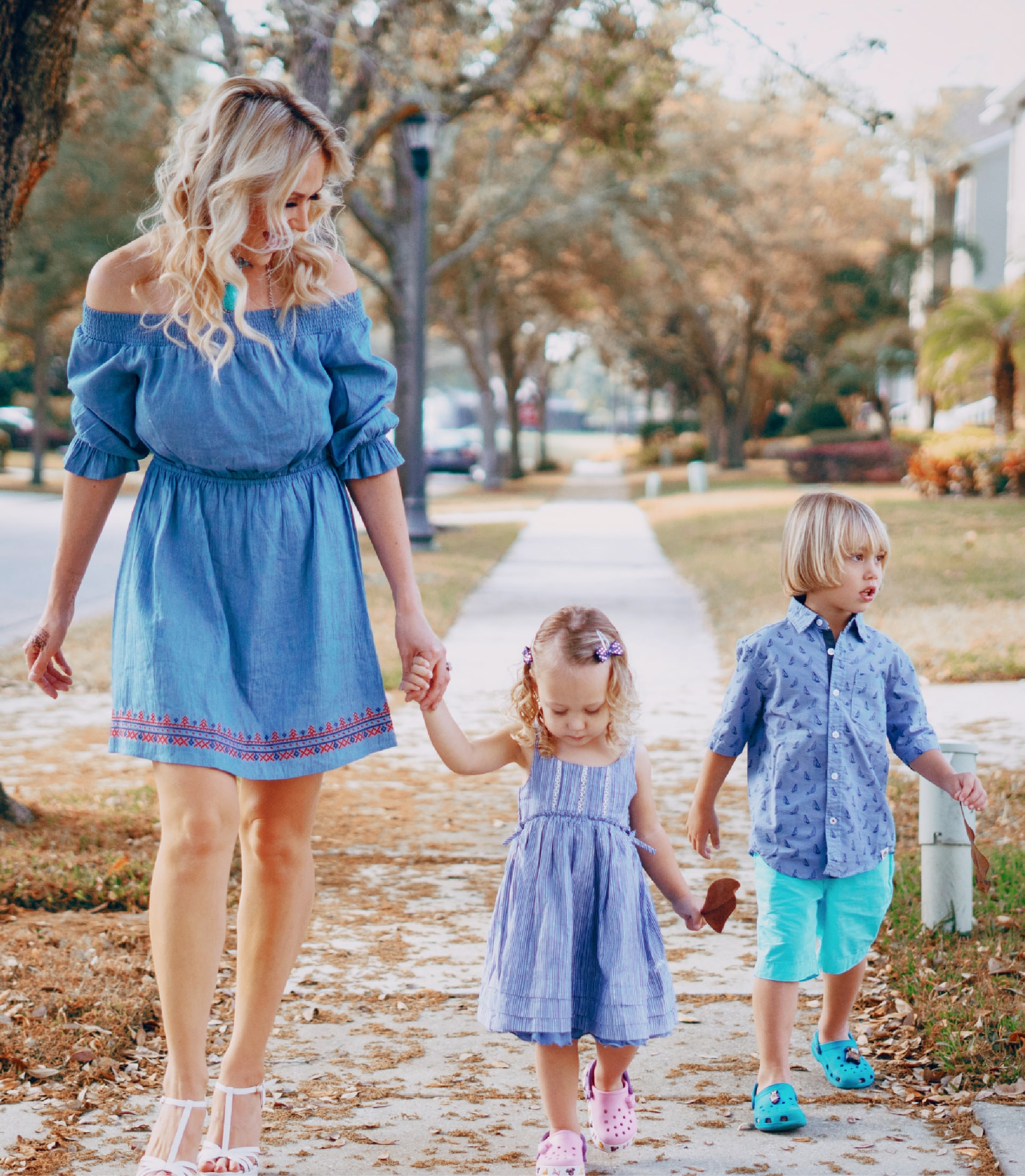 South Brook Webdesign_R6_Welcome Center_Luke-03 A family walking on a sidewalk in alabama